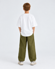 Kids’ Oversized White T-Shirt with Olive Green Pants – Casual Wear Collection